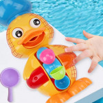 Jucarie de baie ratusca vesela, lopatica apa, ochi rotativi, roata multicolor, 2 ventuze prindere